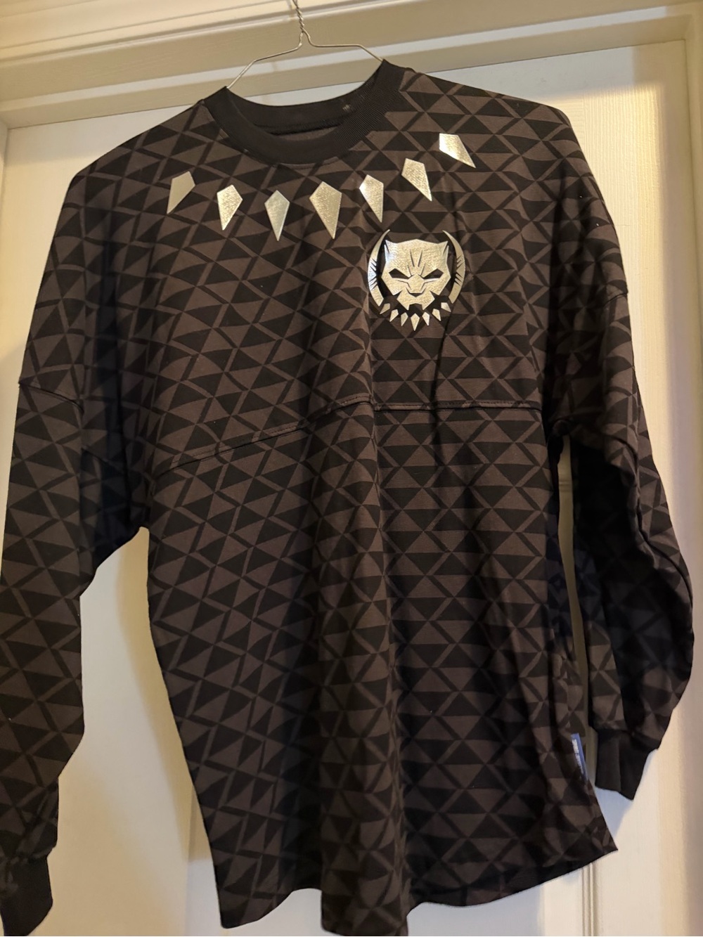 Men's Black Crewneck Sweater with Silver Emblem